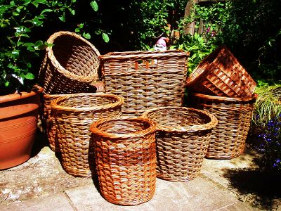 Variety of willow baskets for logs and waste paper